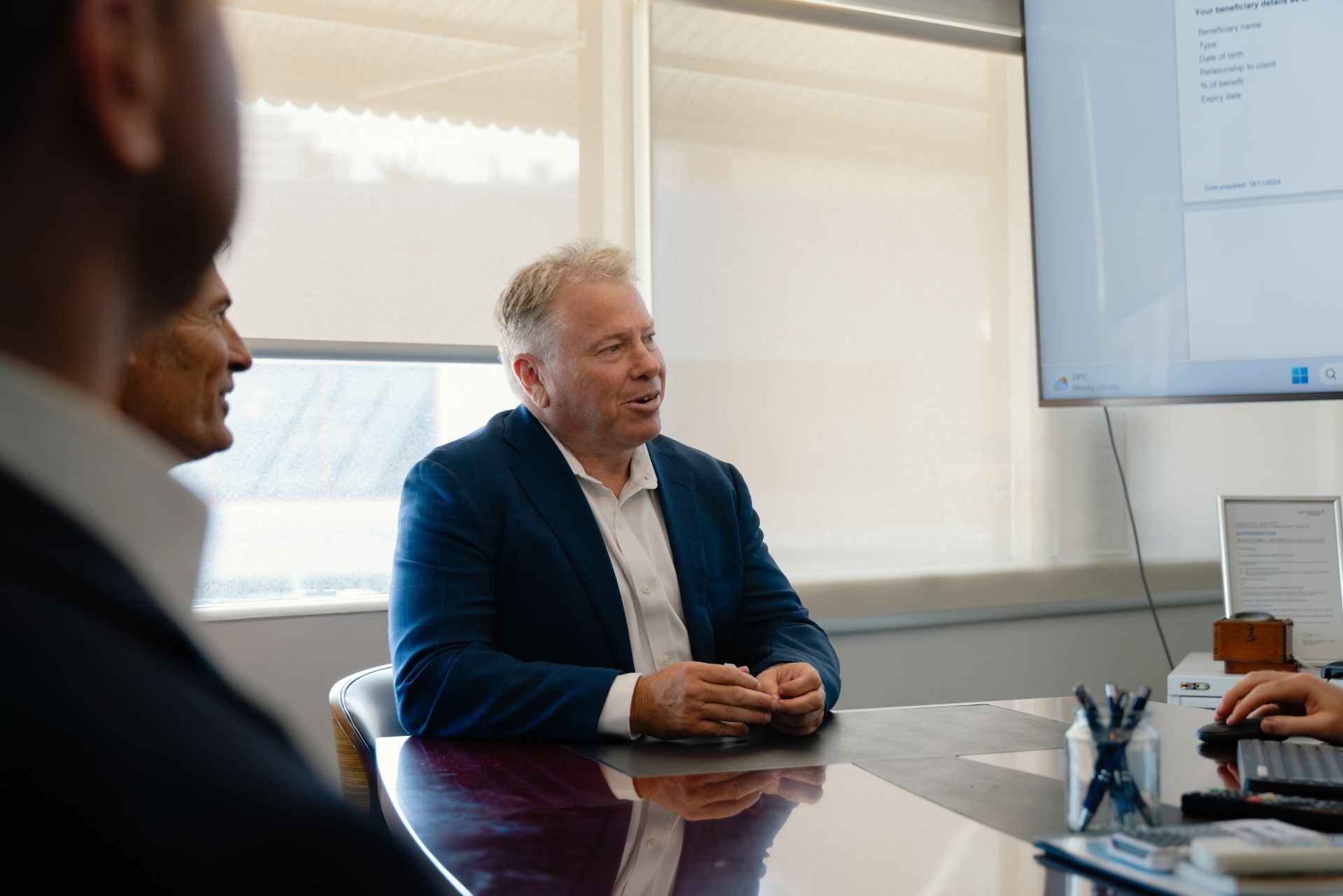 Navigate Financial advisers in a client meeting