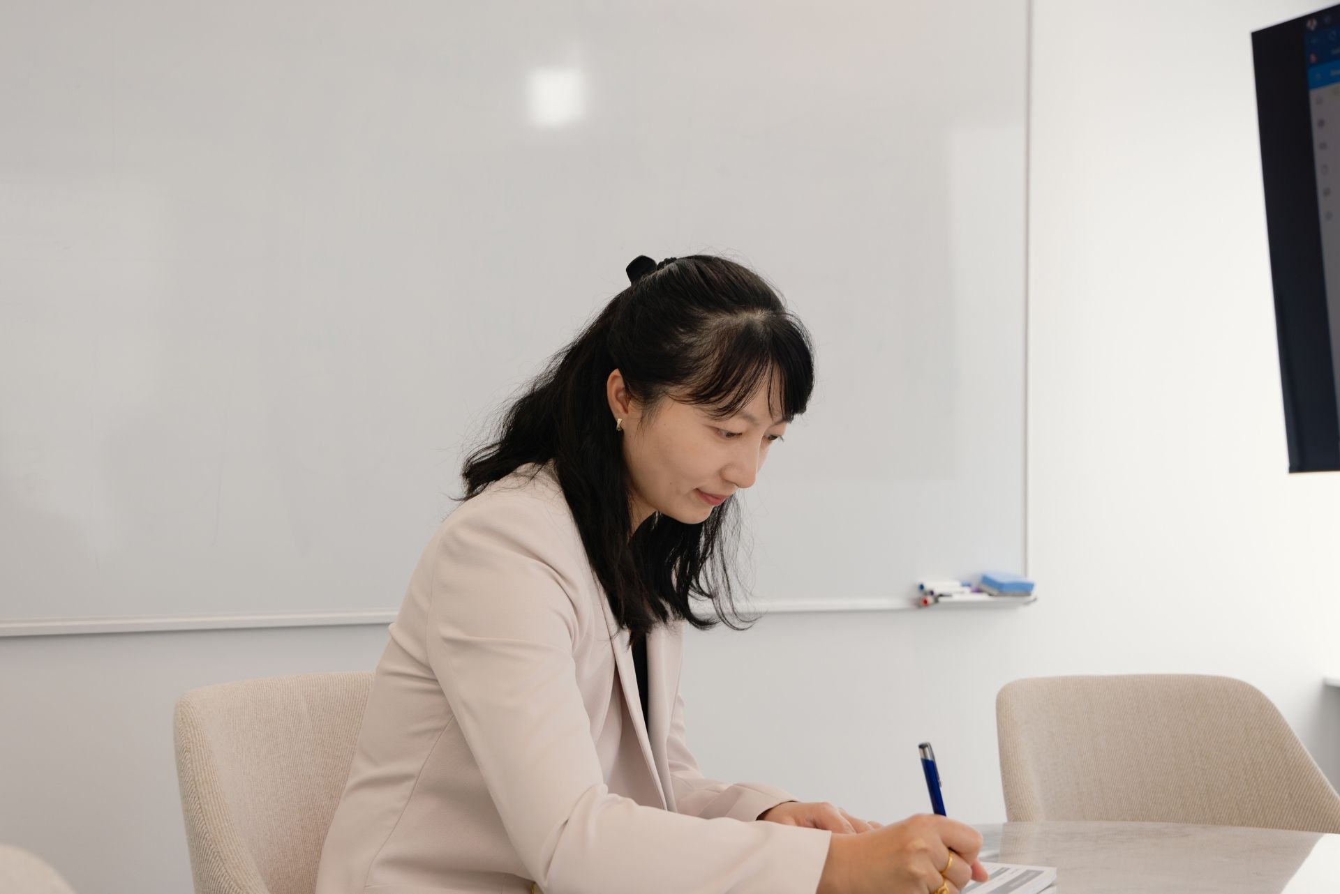 A Navigate Financial adviser preparing advice notes